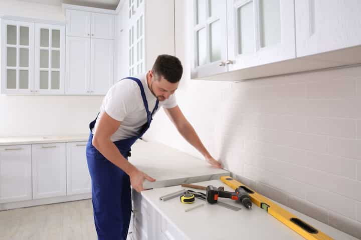 A kitchen countertop made of a durable and stain-resistant material, designed for easy maintenance in Sugar Land